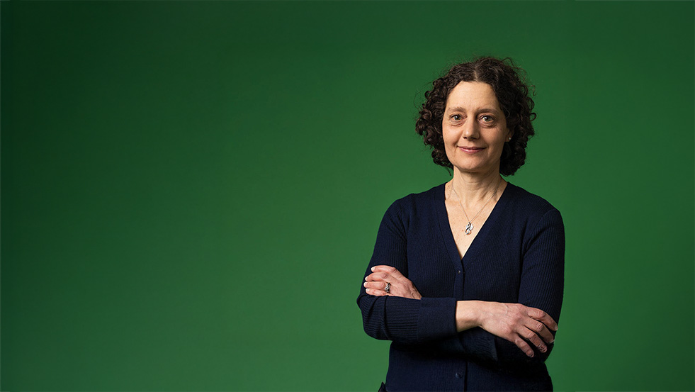 person with arms folded