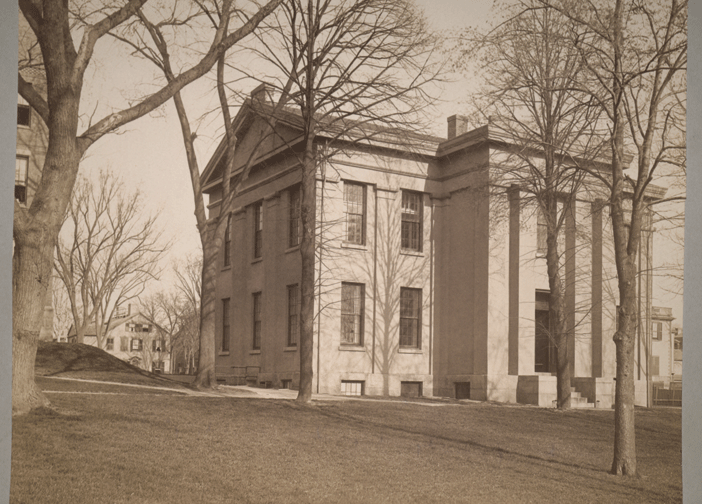 1885: A spacious new biological laboratory opens in Rhode Island Hall. By the end of the century, the edifice is stuffed to capacity, with Jenks Museum of Natural History specimens covering the windows and the osteological collection in the attic. In 1904, an addition is built to replace "the lean-to where live animals were kept."