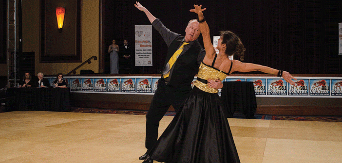 Lou Rice and his dance partner, Joanne Lapierre, strut their stuff for cancer research.