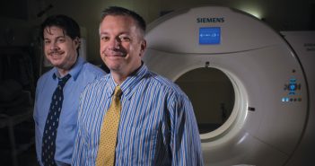 INNER SPACE:Derek Merck, left, and Scott Collins use CT scan data in much of their research. (Photo Credit: Jason Rossi).