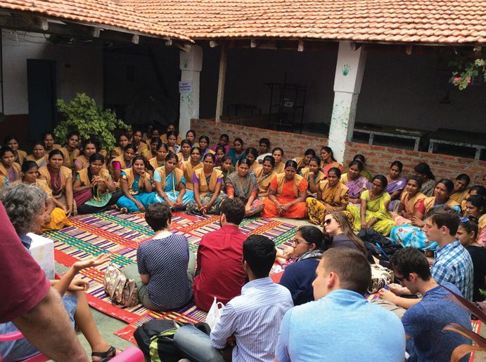 ON-THE-GROUND EXPERIENCE: MPA students learn about global policy at a nonprofit in India. Photo courtesy Watson Institute