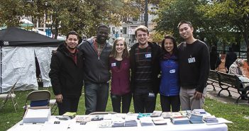 From left, Christian Delacruz, a former foster youth; Frank Paul, an MSW student at the Rhode Island College School of Social Work; and Warren Alpert medical students Gerianne Connell, James Maiarana, Alice Cao, and Austin Tam volunteered at the Fostering Hope table at a health fair in Providence last year. Photo courtesy Fostering Hope