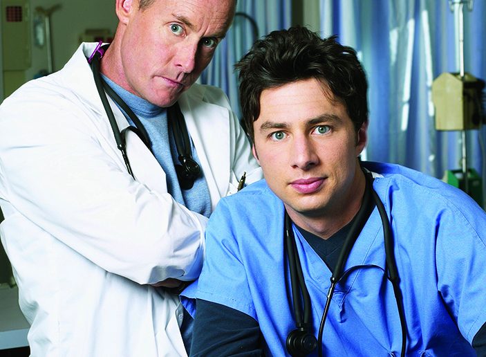 SCRUBS -- Season 1 -- Pictured: (l-r) John C. McGinley as Dr. Perry Cox, Zach Braff as Dr. John 'J.D.' Dorian (Photo by Chris Haston/NBC/NBCU Photo Bank via Getty Images)