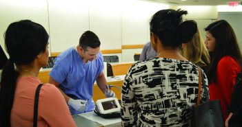 LOOK HERE: Jason Iannuccilli ’00 MD’05 RES ’10 demonstrates an ablation therapy at the regional IR symposium at Brown last year. Photo by Ishan Sinha '16 MD'20