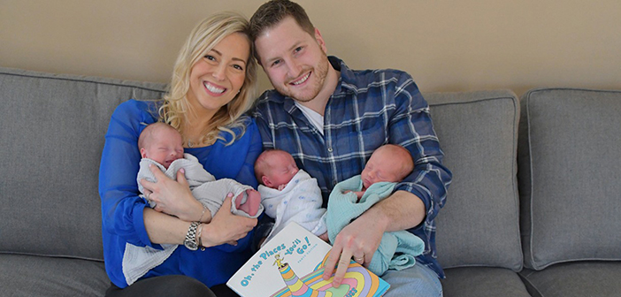 Jillian Hobbins, here with her husband, Adam, and their fraternal triplet boys are enrolled in the Hassenfeld Study.